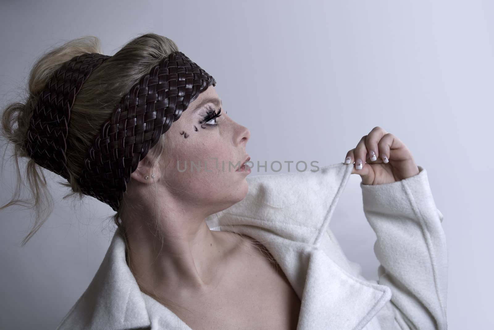 Fashion portrait of a blond girl showing by DNFStyle