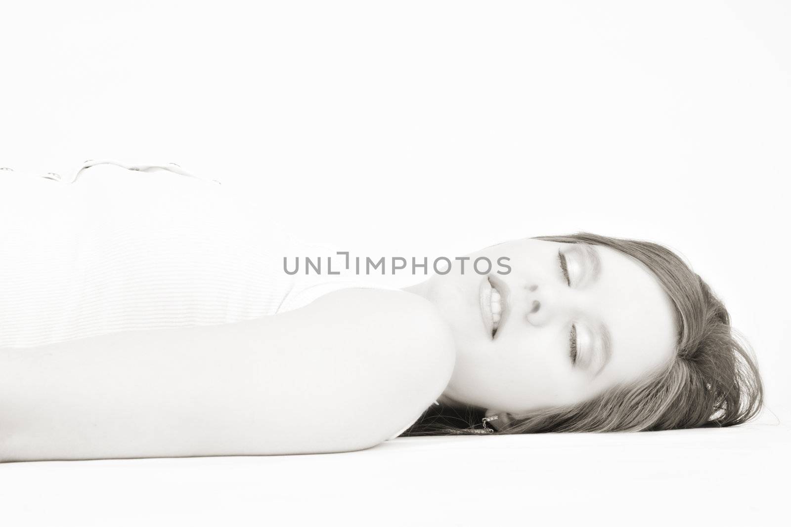 Beautiful model lying on the studio floor by DNFStyle