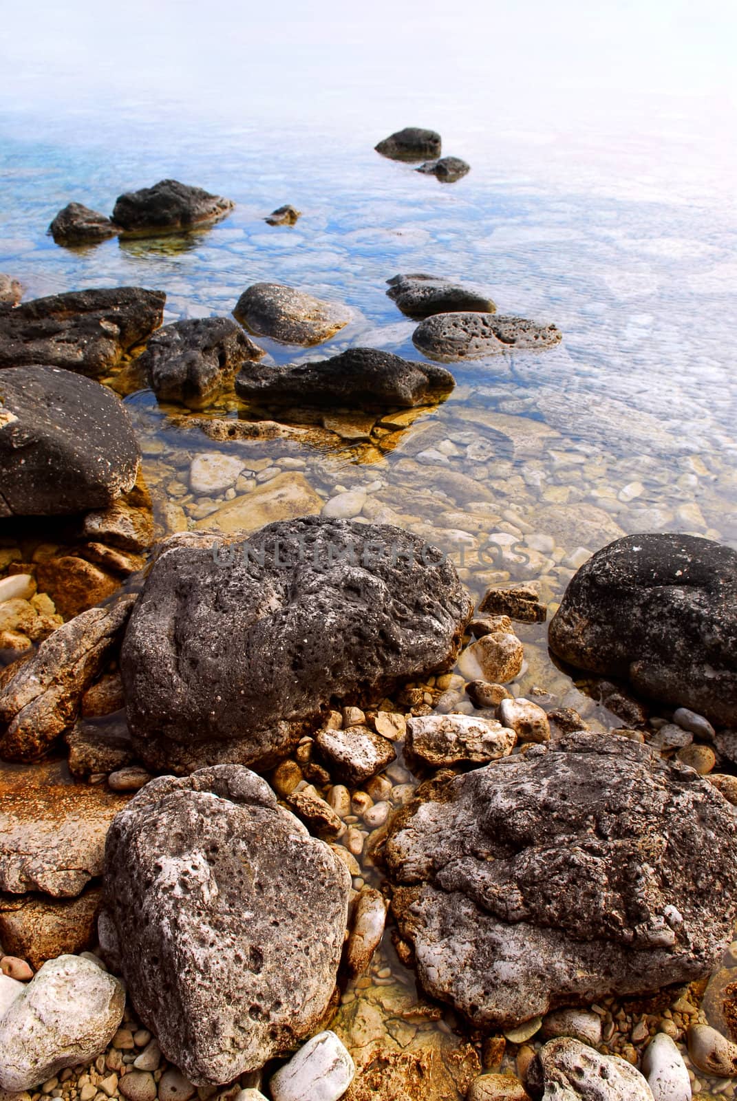 Rocks in clear water by elenathewise