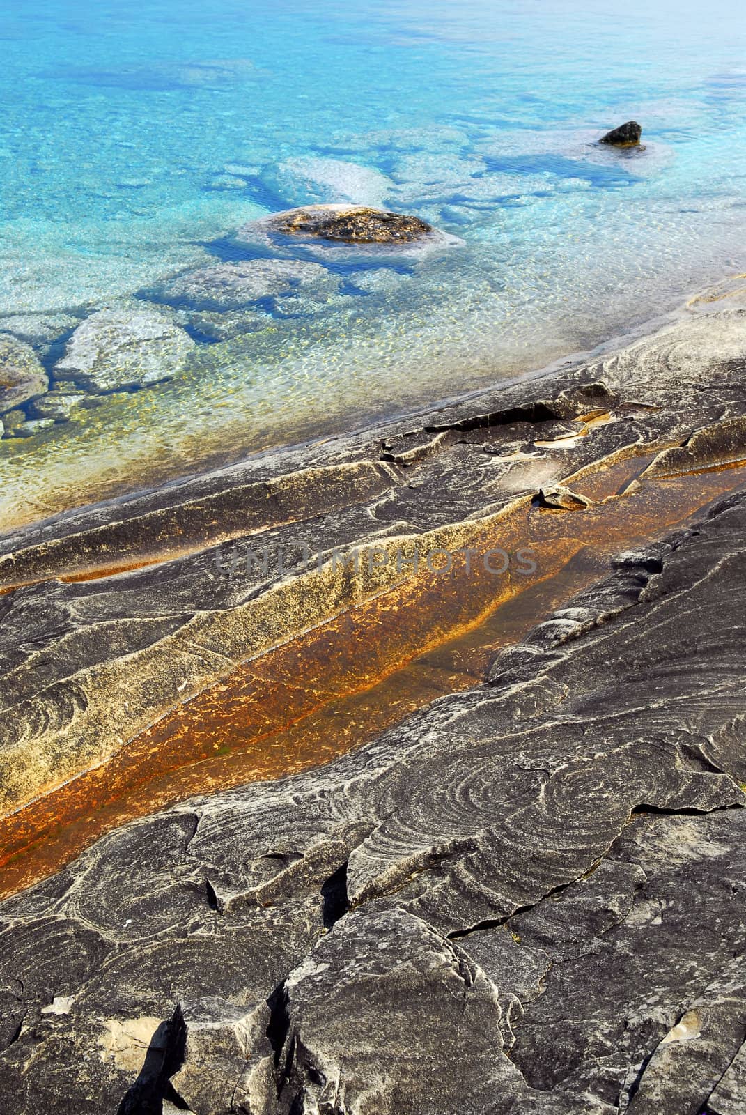 Rocks and clear water background by elenathewise