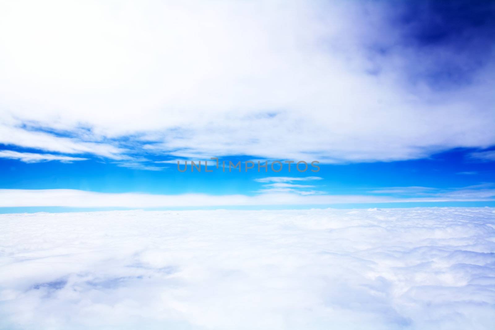 Blue sky and white clouds. Photo taken from high altitude.