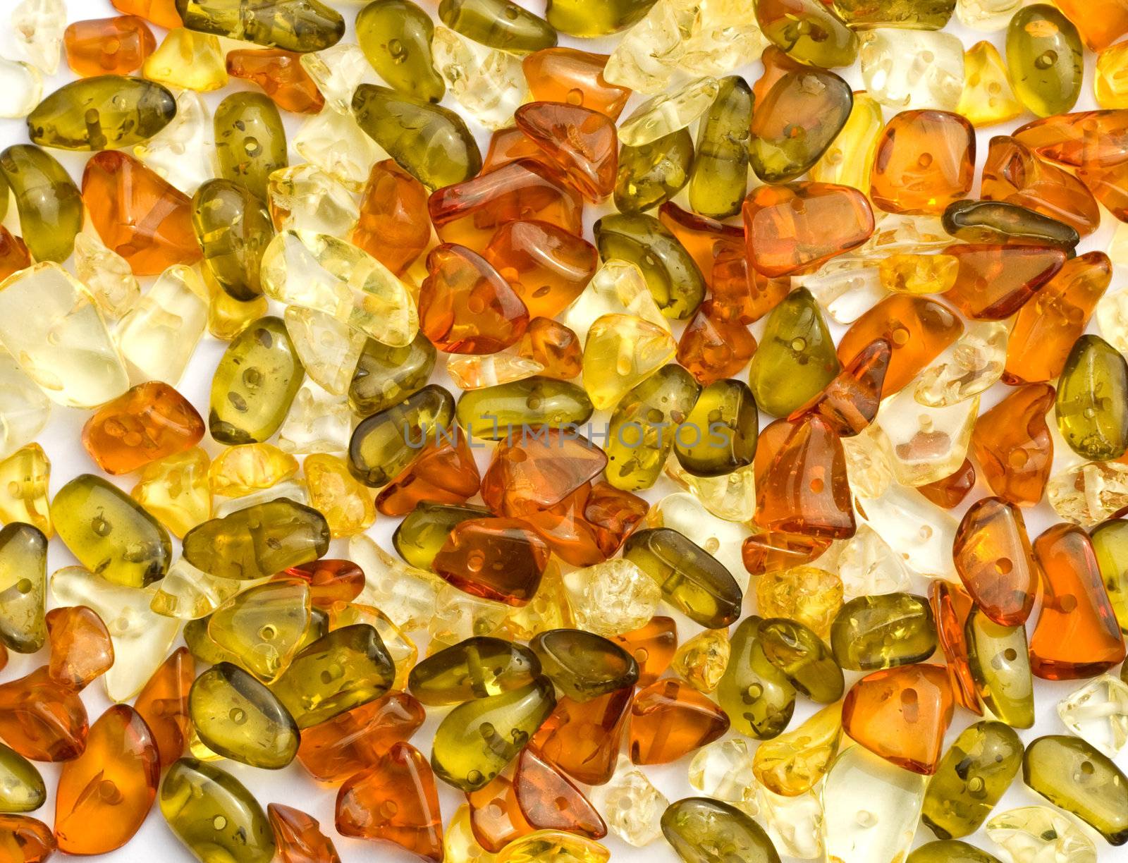 Amber beads on white background