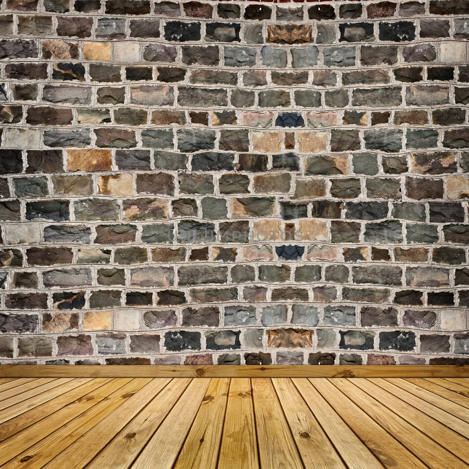 coarse stone wall and the wooden floor 