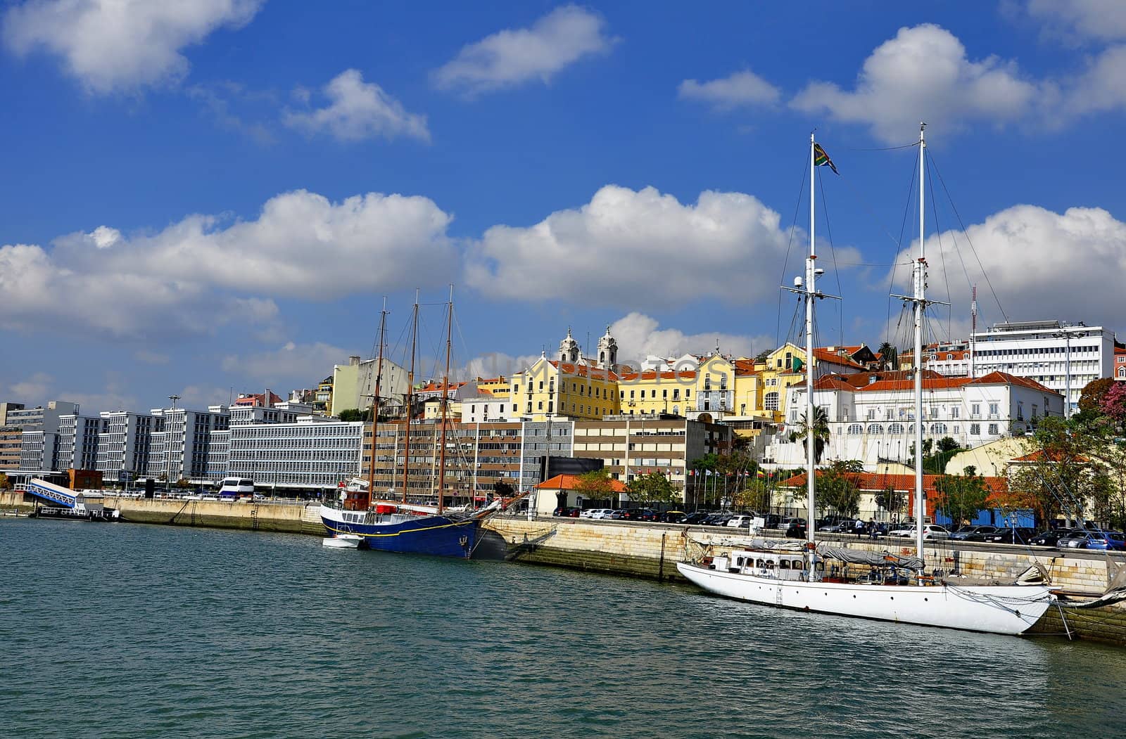 Sailboats, ships in port on the dock