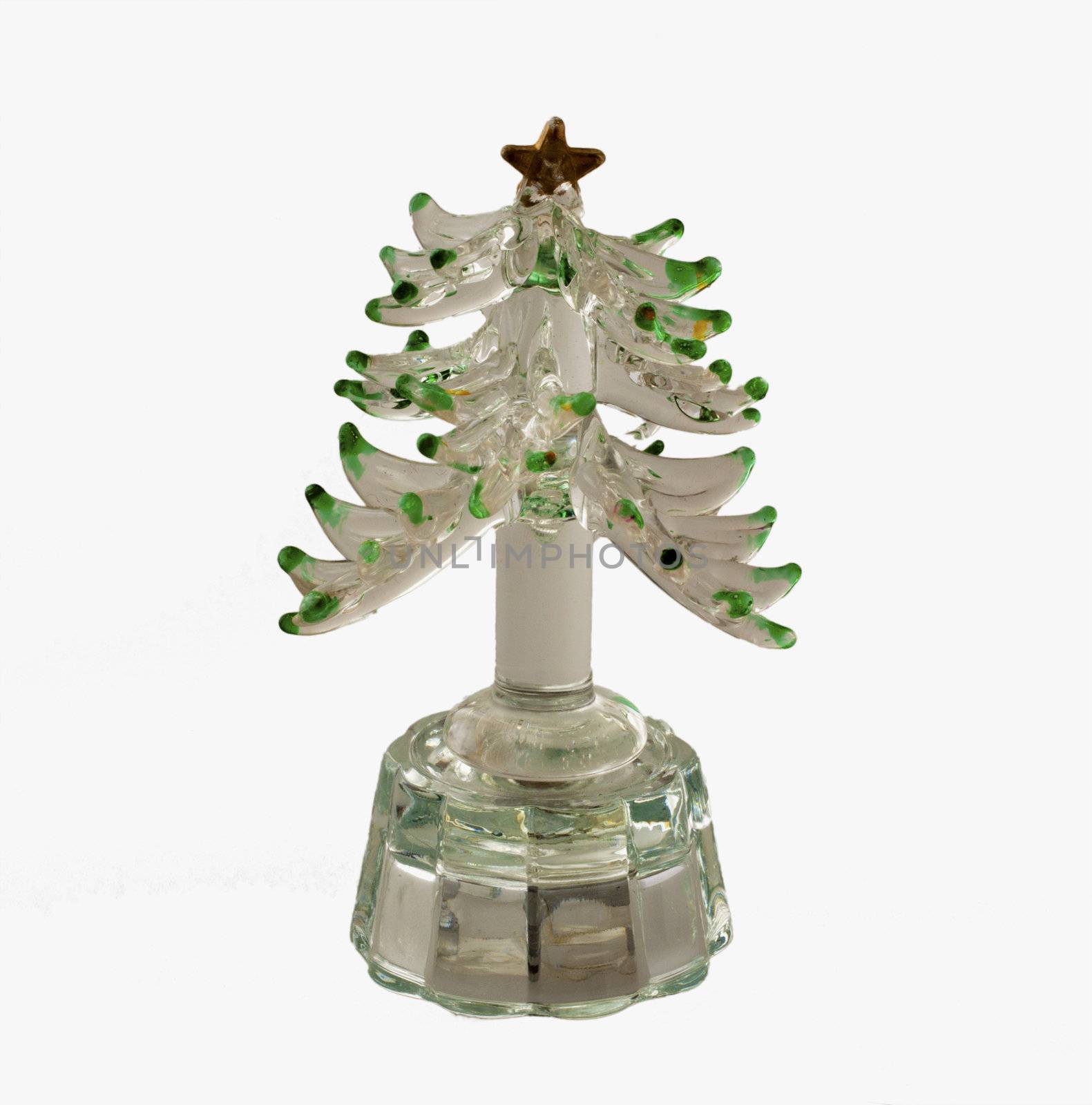 Little plastic Christmas tree for decoration over white background