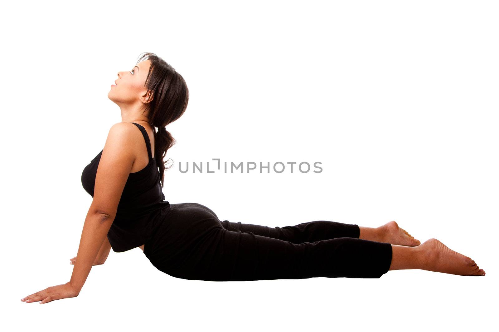 Beautiful attractive woman stretching exercise workout Cobra Yoga position, dressed in black, isolated.