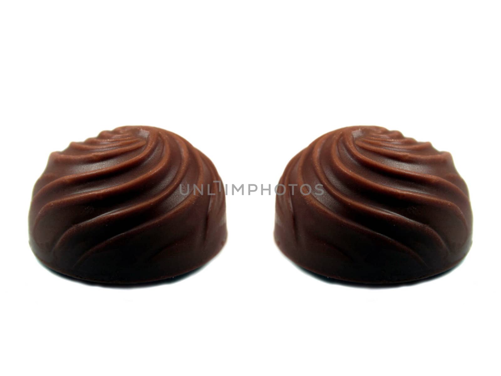 Two  chocolate candy isolated on white background.