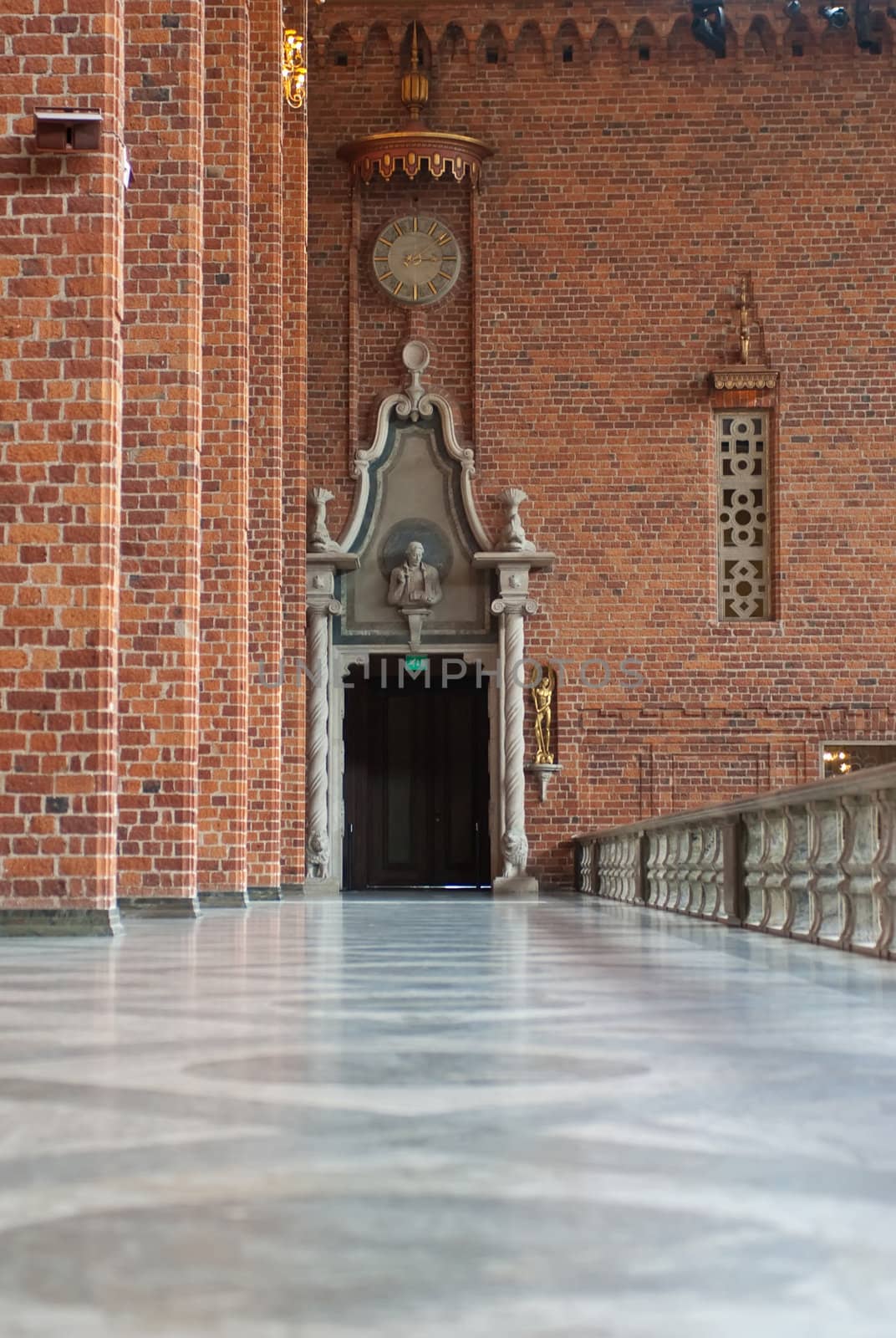 a walkthroug of the swedish city hall with a door at the end