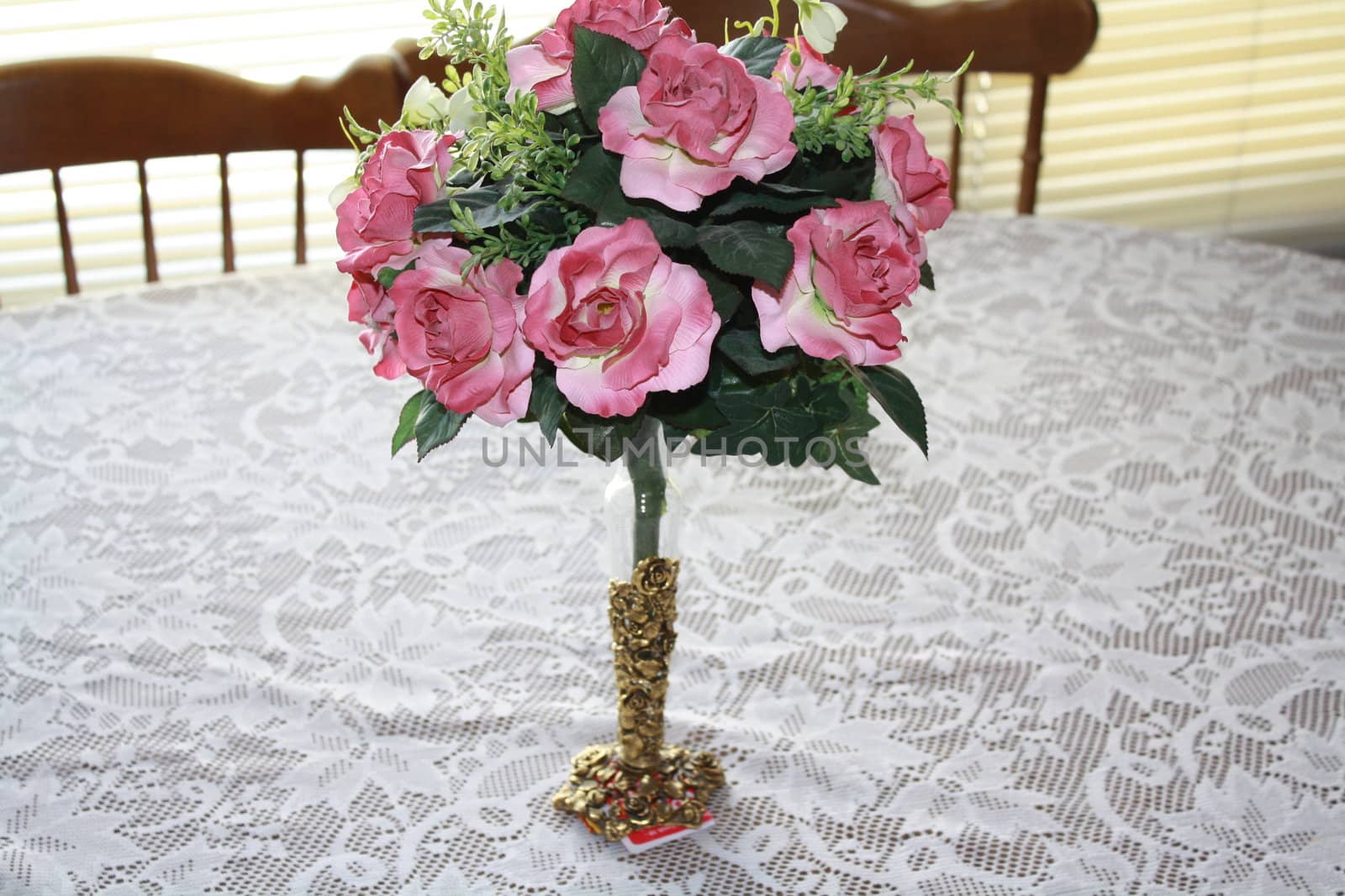 a pretty vase of flowers on a table
