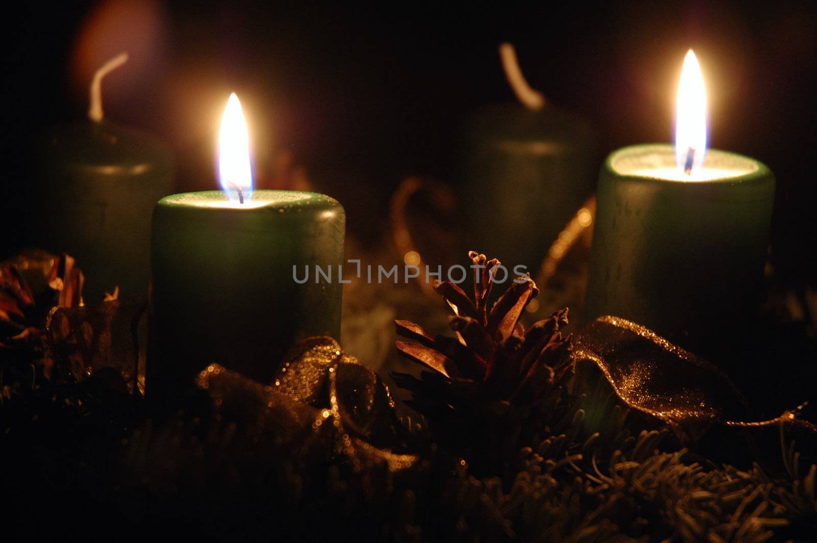 Shot of candles burning on advent wreath