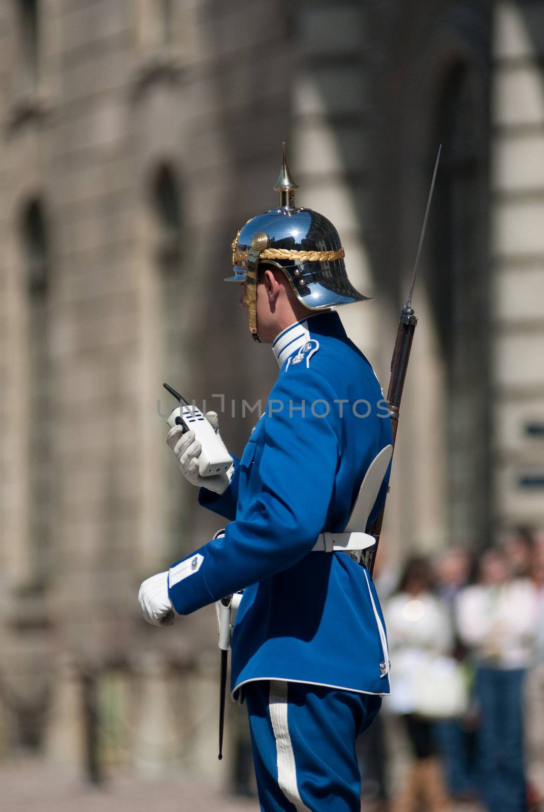 the guards are changing daily in front of the royal palace in stockholm. many tourists attend to this ceremony