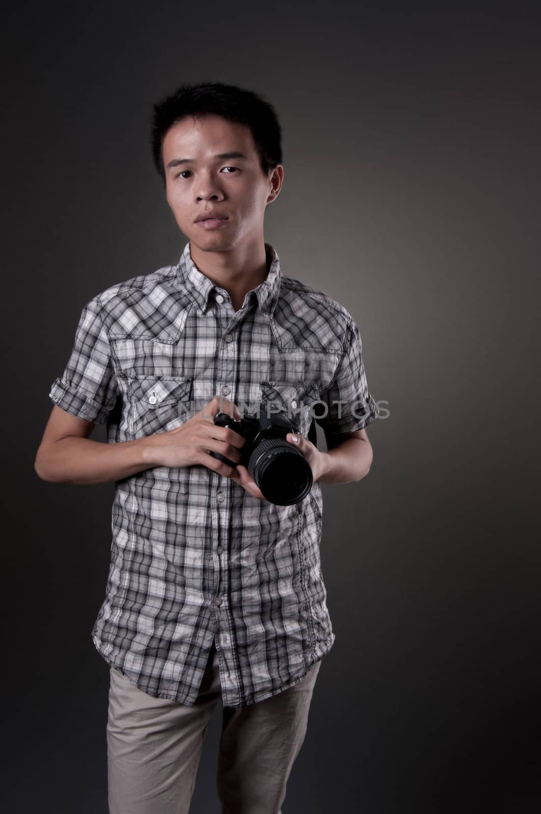 Man Holding Camera by elemery