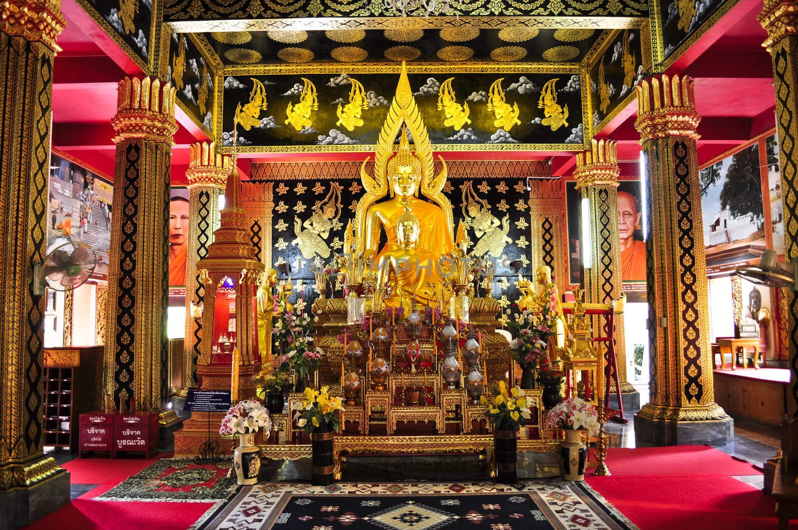 Golden buddhist shrine and decorations in Thailand