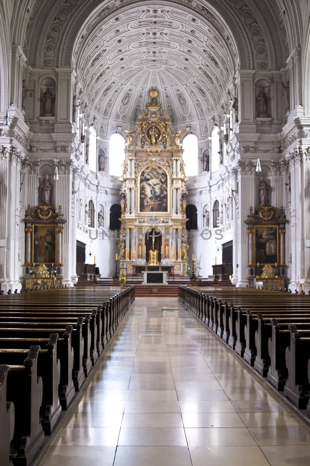 A large European cathedral interior with pews