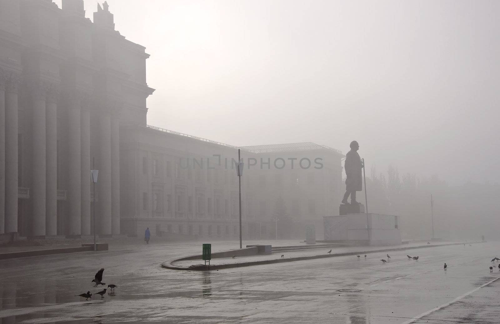 Foggy cityscape. The building of the Opera and Ballet in Samara. Russia. Stalinist architecture.