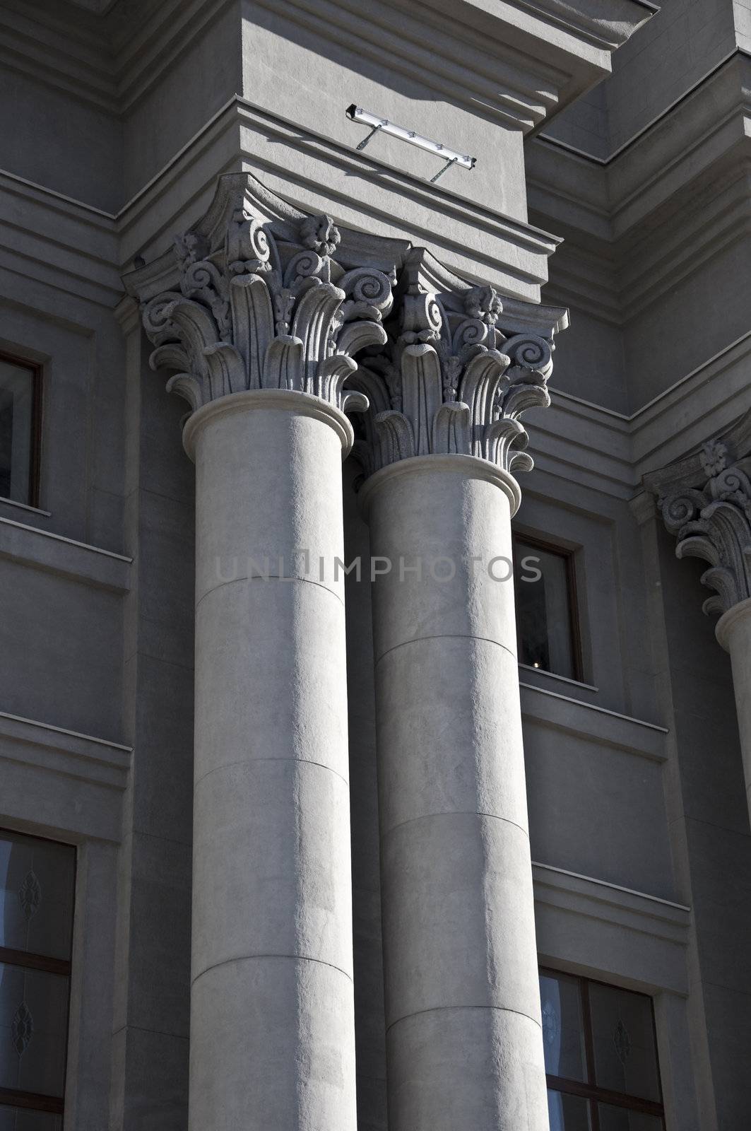 Corinthian order. Classical twin column. Stalinist architecture is classic, a fragment of the facade.