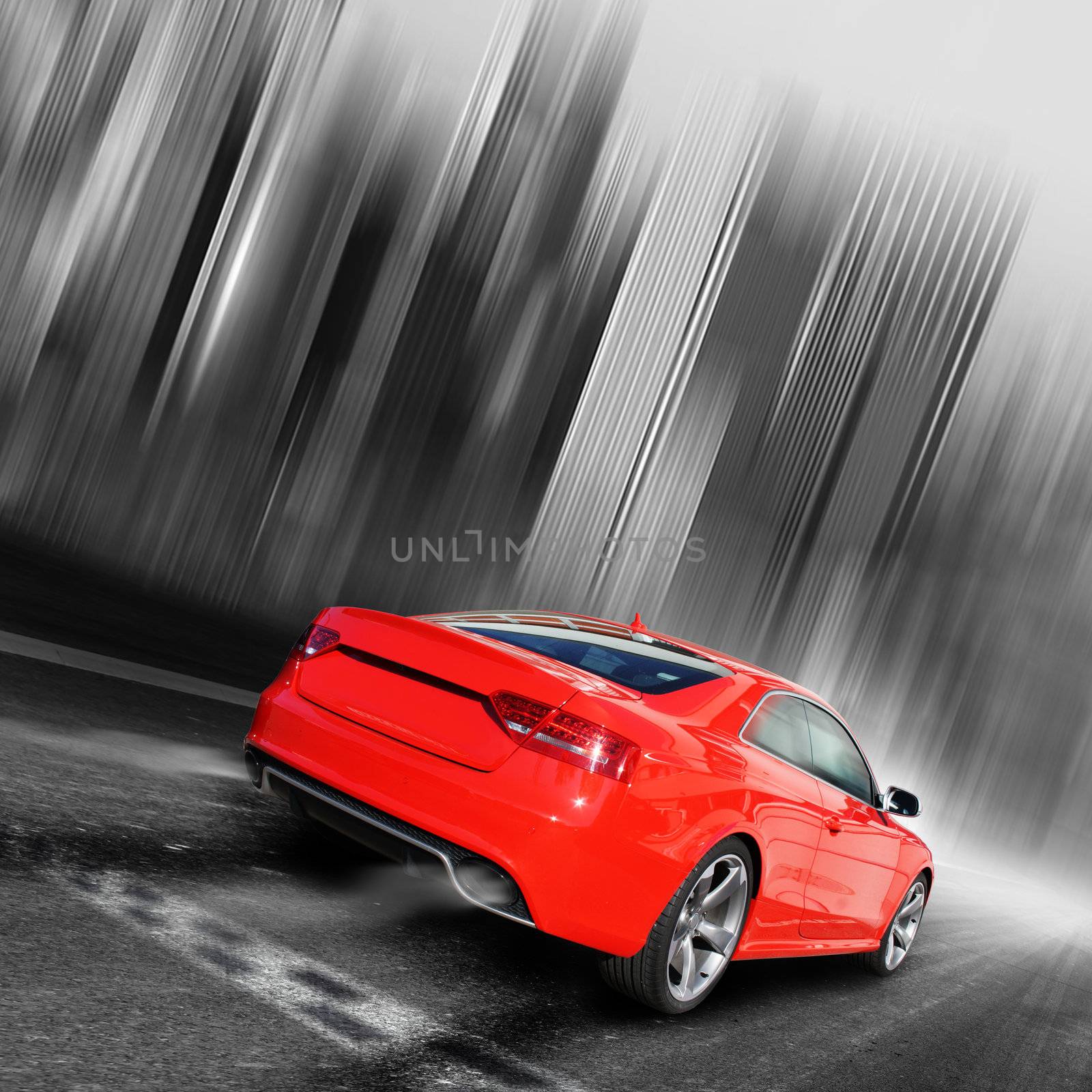 red sports car on a black/white background