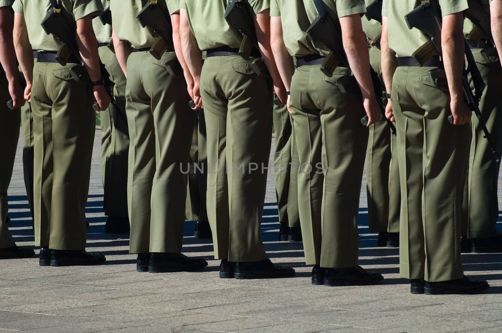 australian soldiers, two rows, holding weapons, detail photo