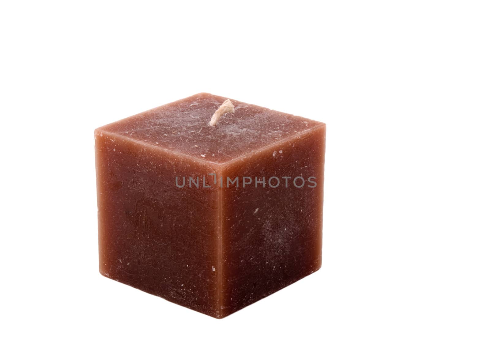 Aromatic cinnamon candle on white background