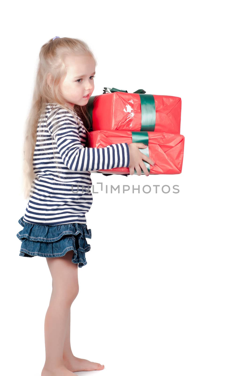 Shot of little cute girl with long hair in studio