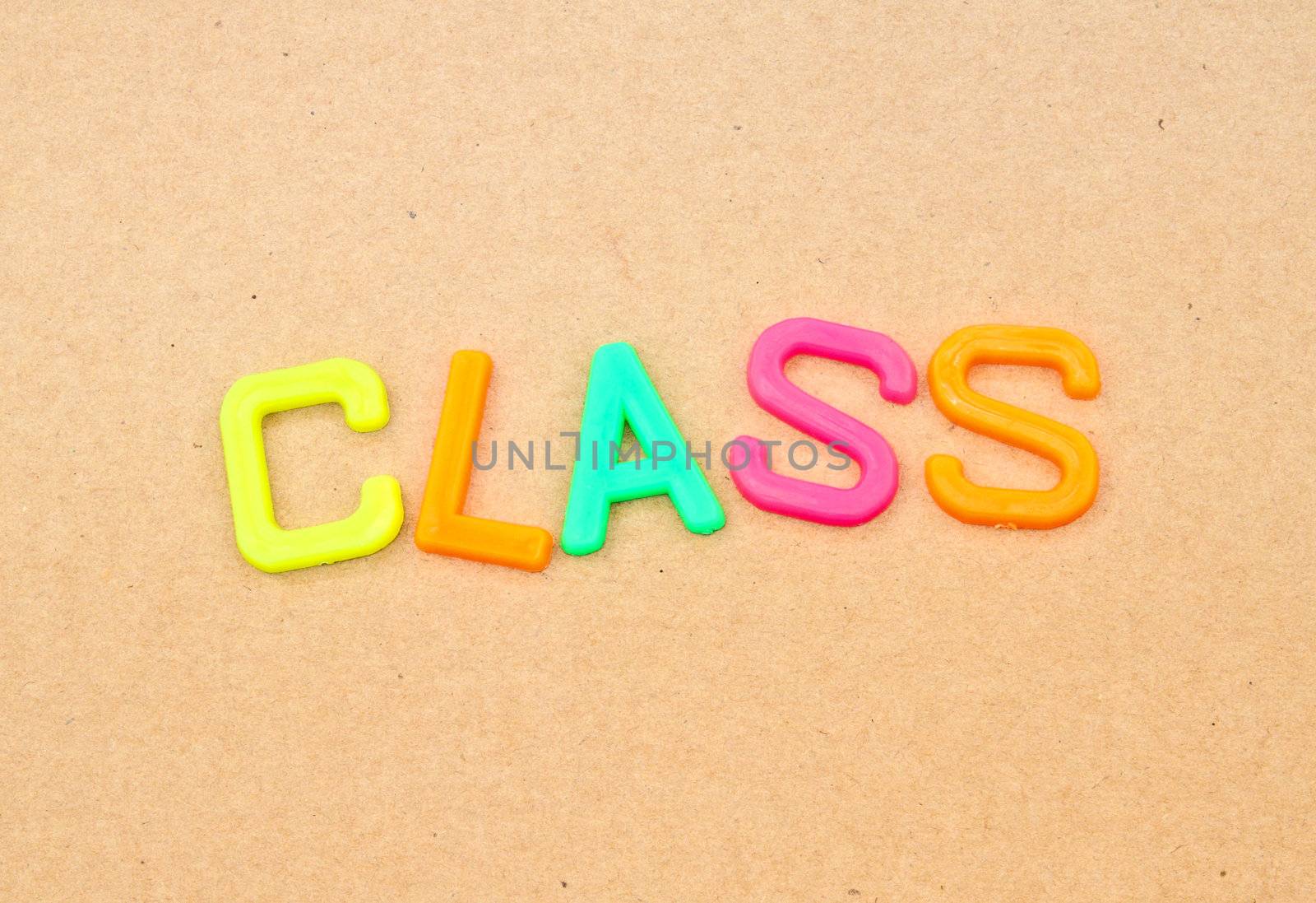 Class in colorful toy letters on paper background