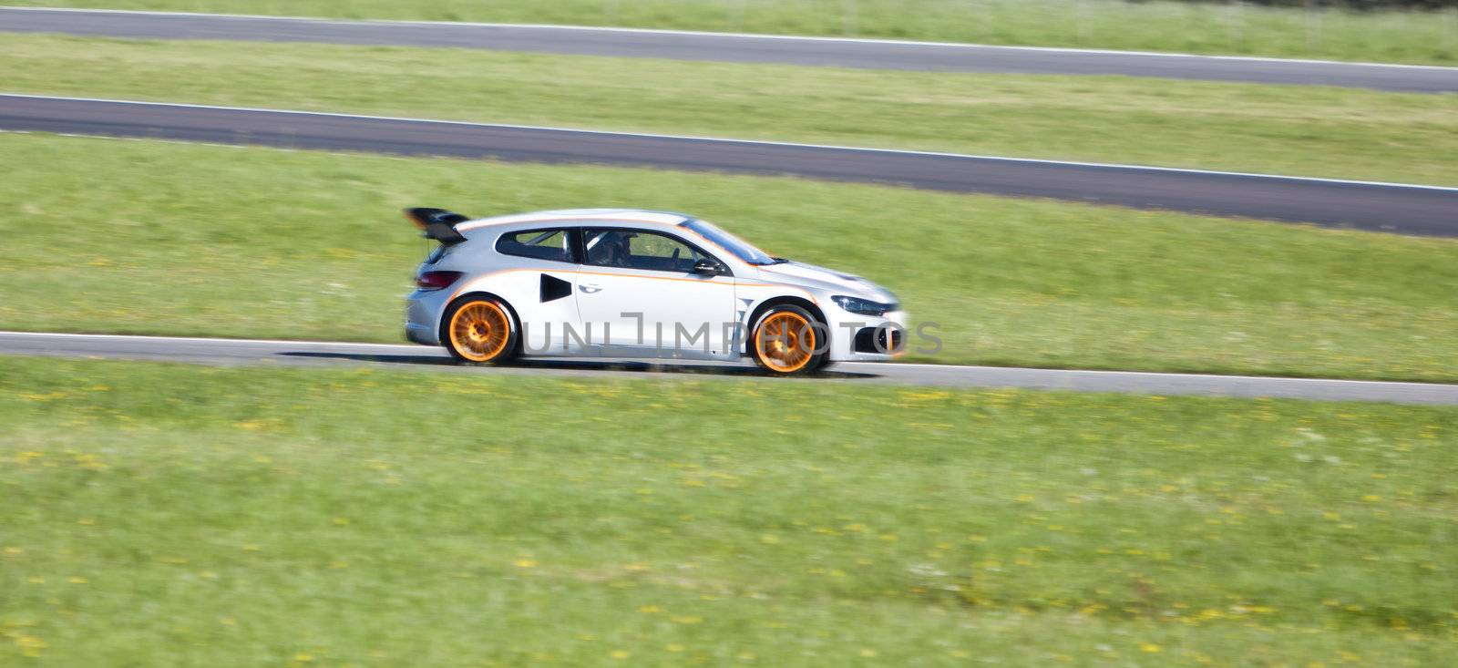 Racing car in action on a summer day