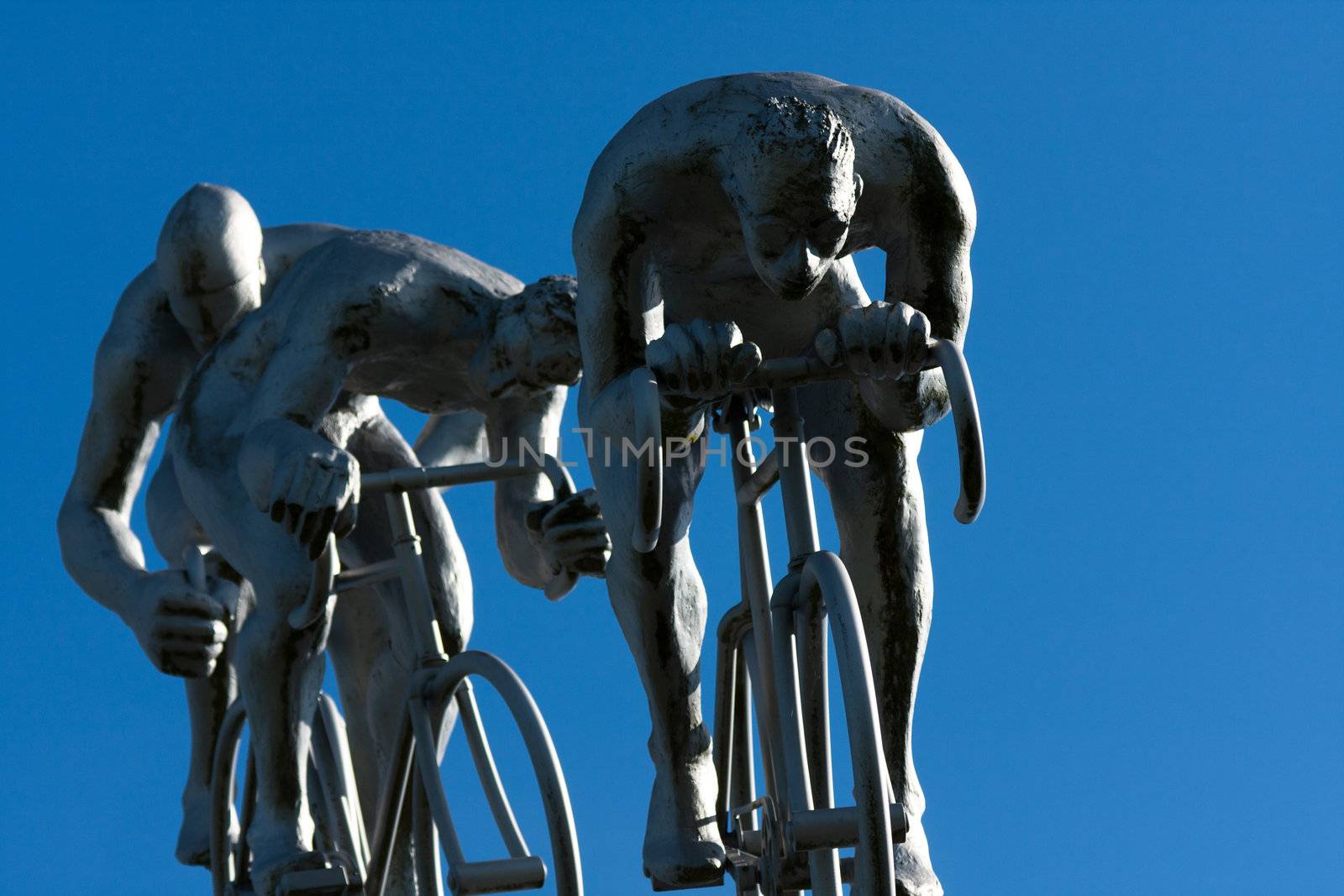 Three cyclists in a slope by allg