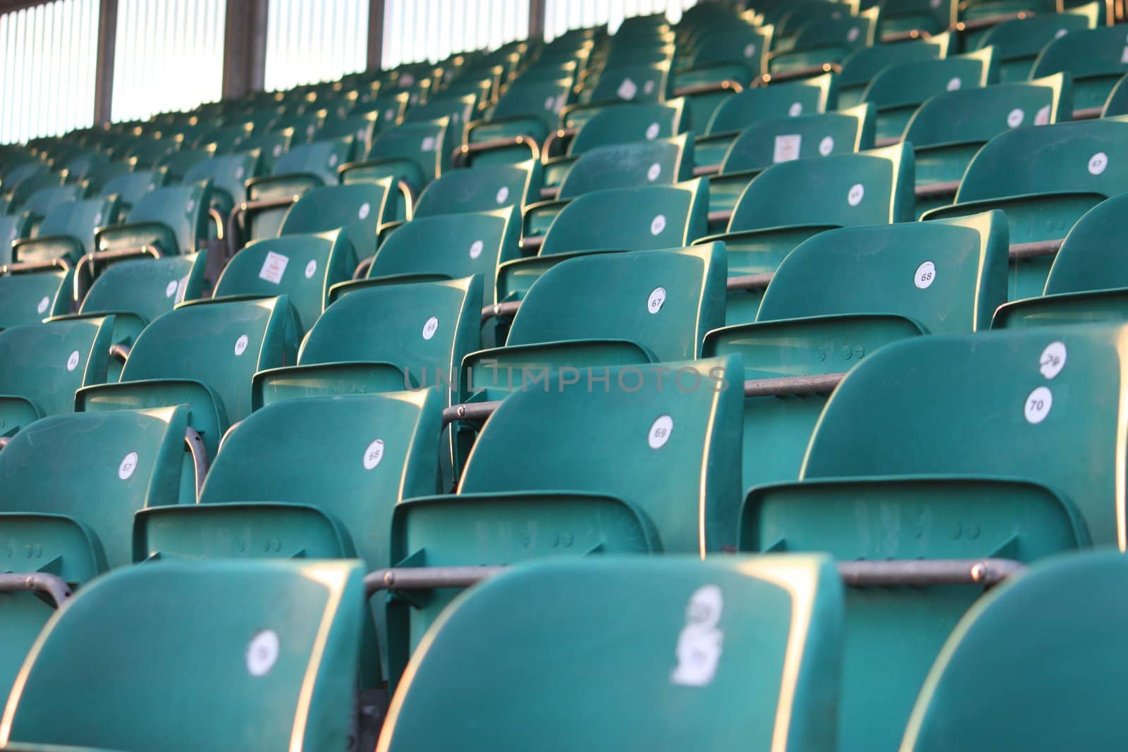 Rows of empty seats in a grandstand