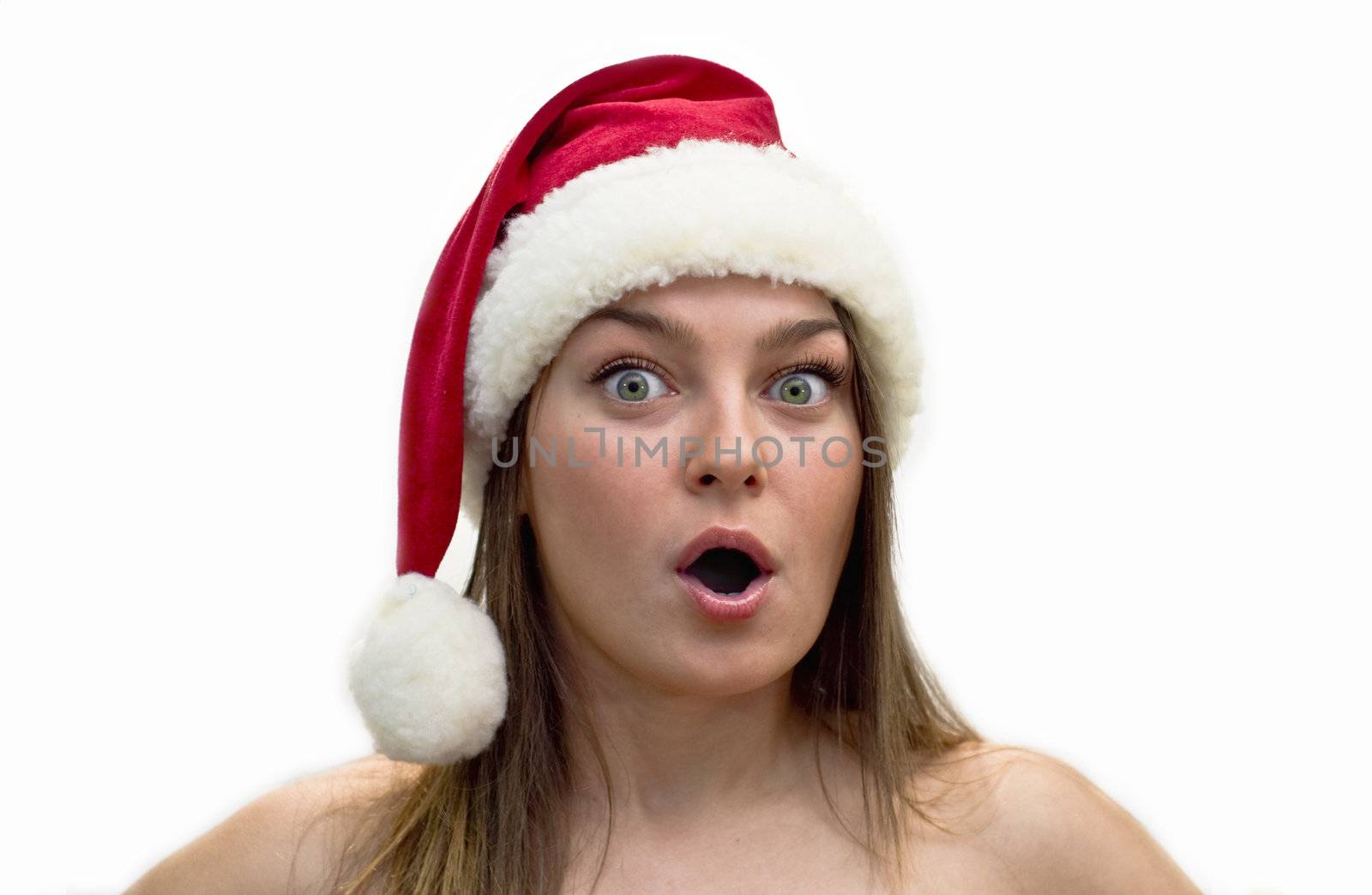Surprised young women in a Santa Claus hat. Studio shot, isolation on a white background