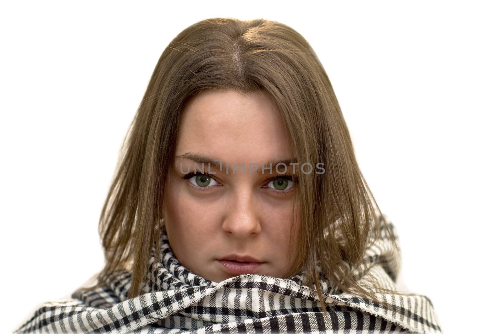 Young woman with green eyes in a checkered scarf. Studio snapshot isolation.