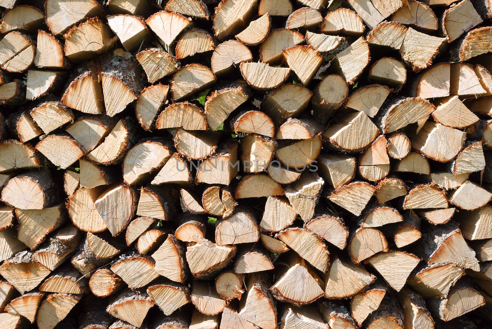 Wood pile, interesting composition.stack of logs for firewood
