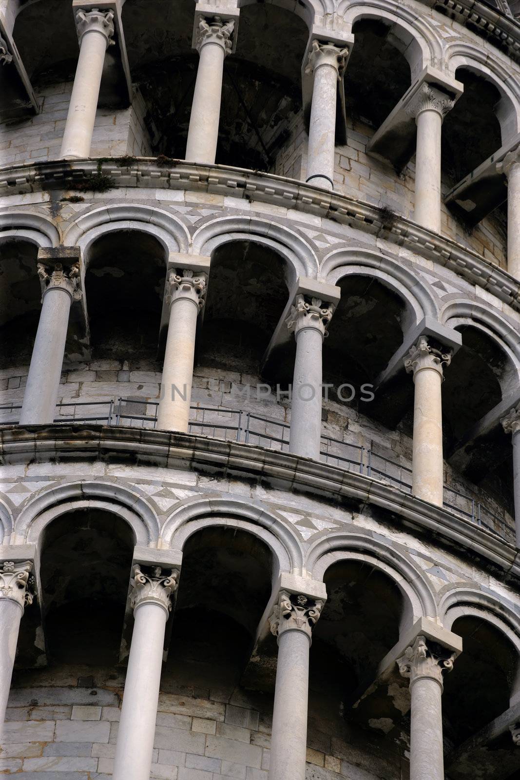 Close up of the arches from the Leaning Tower of Pisa.
