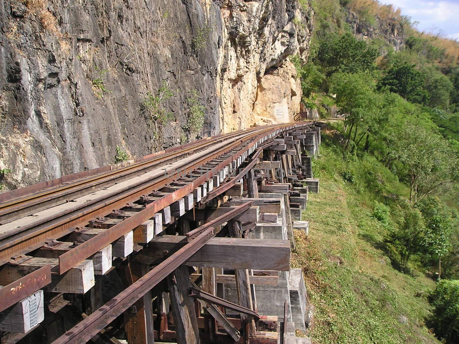 old railroad goes along the cliffs into the uncertainty. On it drive the trains already long ago. This is history. 