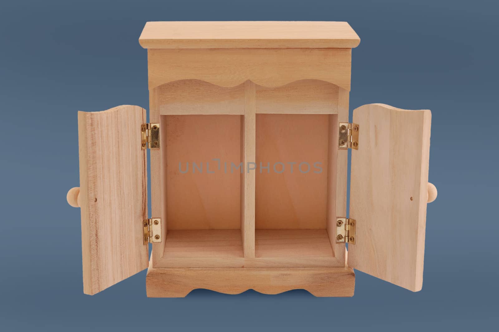 small wooden cupboard isolated on gray, with clipping path