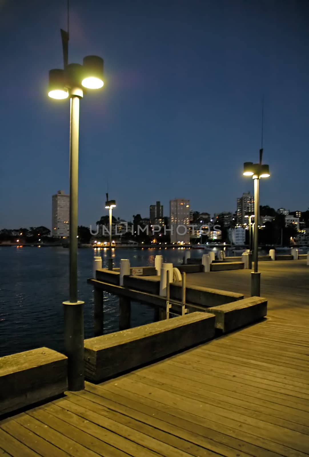 wooden wharf in night, street lights, Sydney