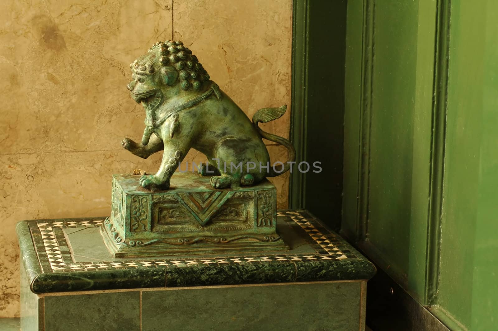 green lion sculpture, chinese architecture, the lion is guarding entrance