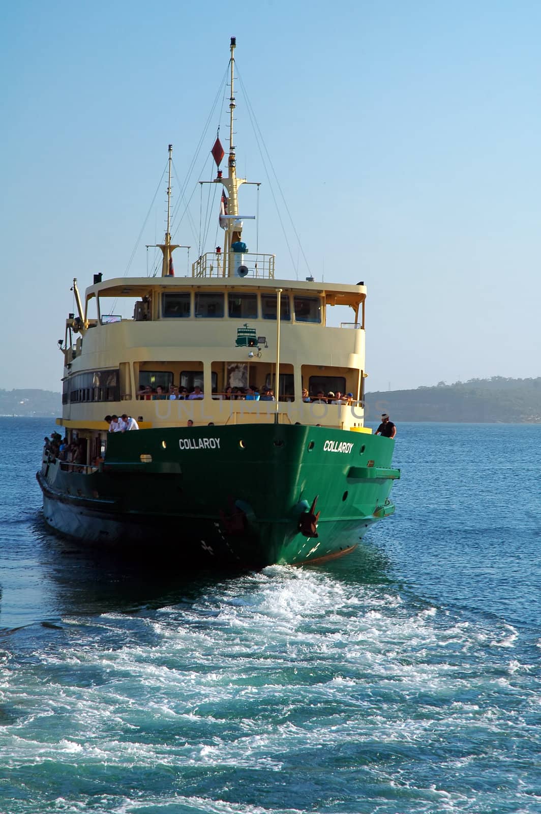 sydney ferry, green bottom, yellow top, blue sea and sky