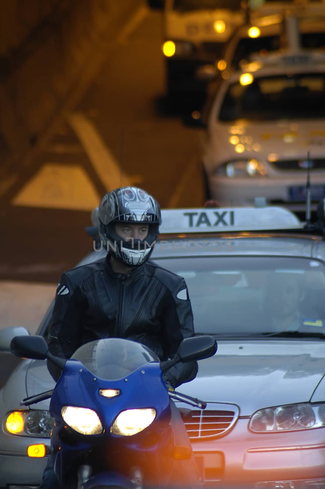 motorcycle and cars waiting at traffic lights, location: Sydney