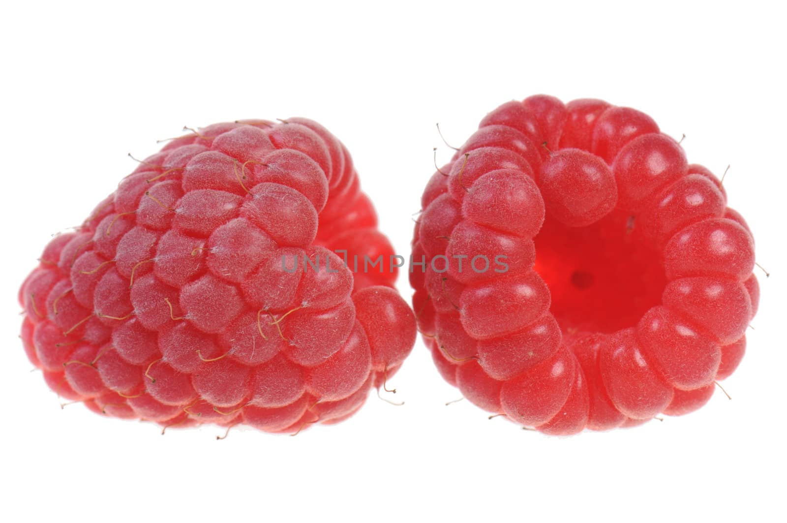 Delicious raspberries isolated on white background 
