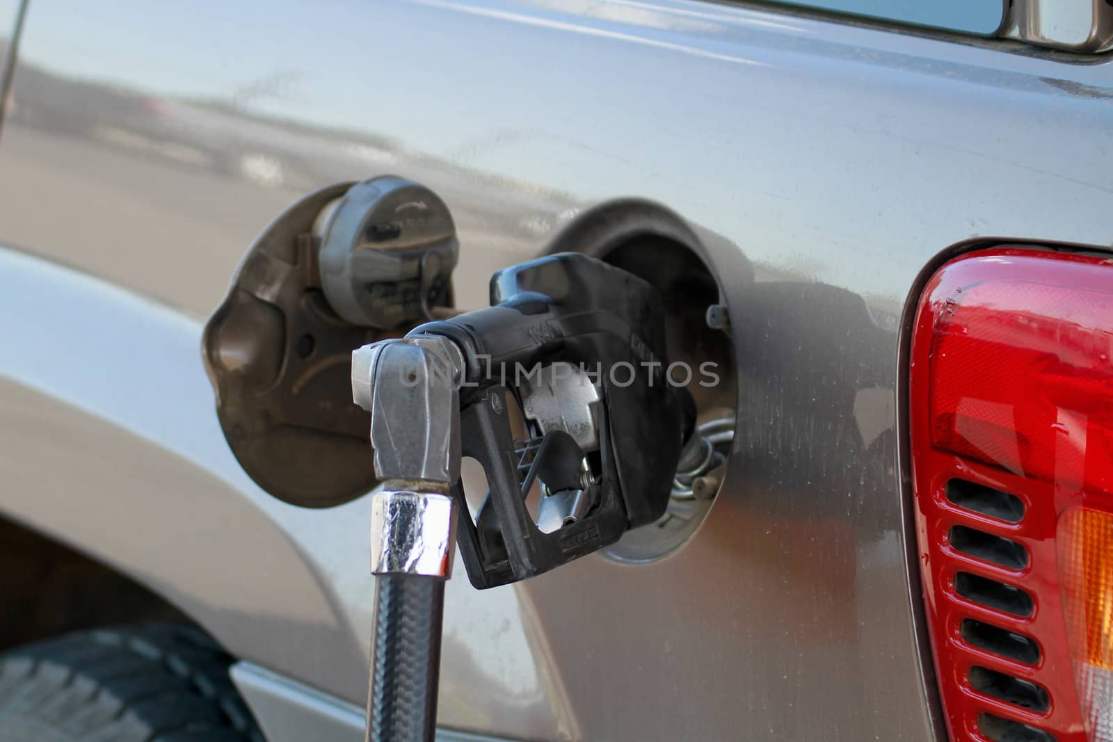 Pump Filling Up the Car at the Gas Station 2