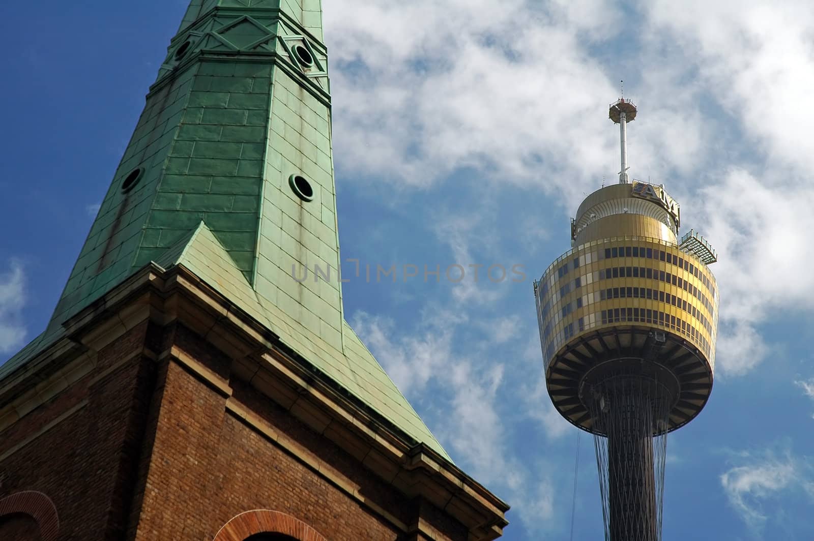 religion in sydney, church tower detail, sydney tower detail, blue sky with clouds