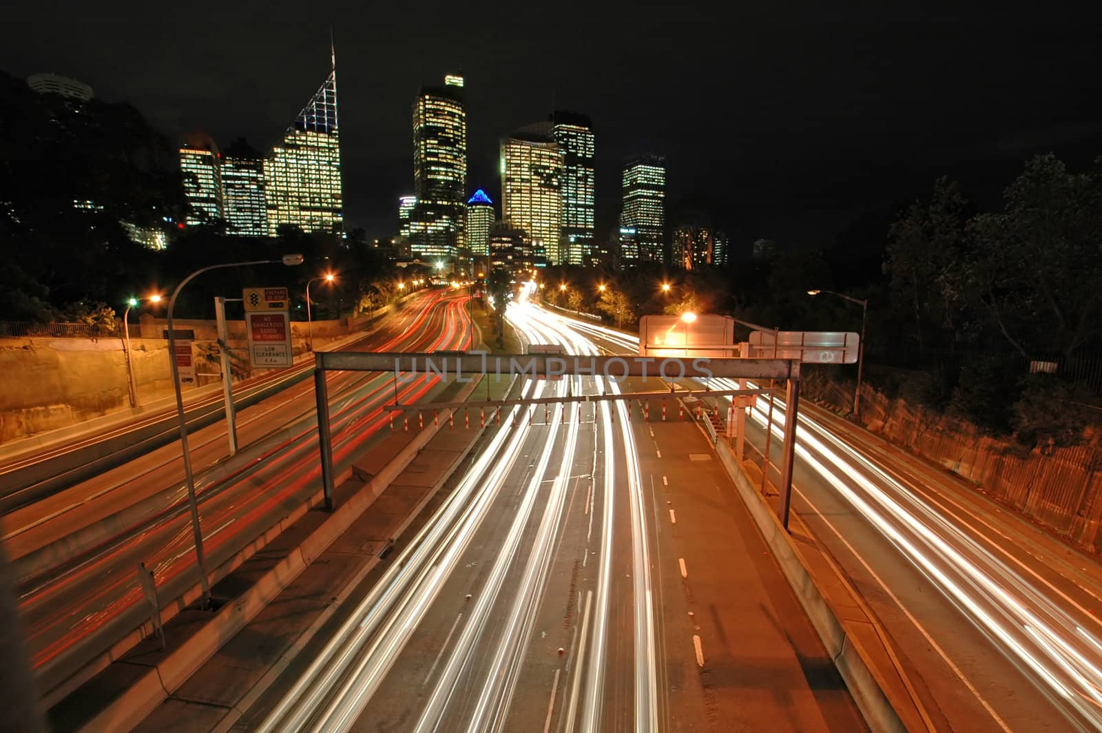 night traffic in Sydney, Sydney CBD in background, car light trails