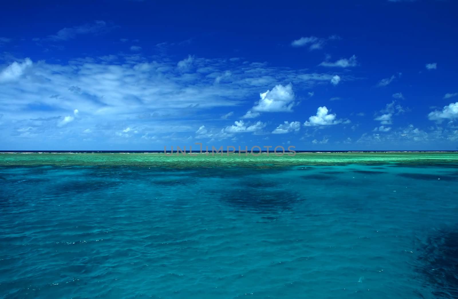 Great Barrier Reef near Cairns, Australia; cloudy sky, 