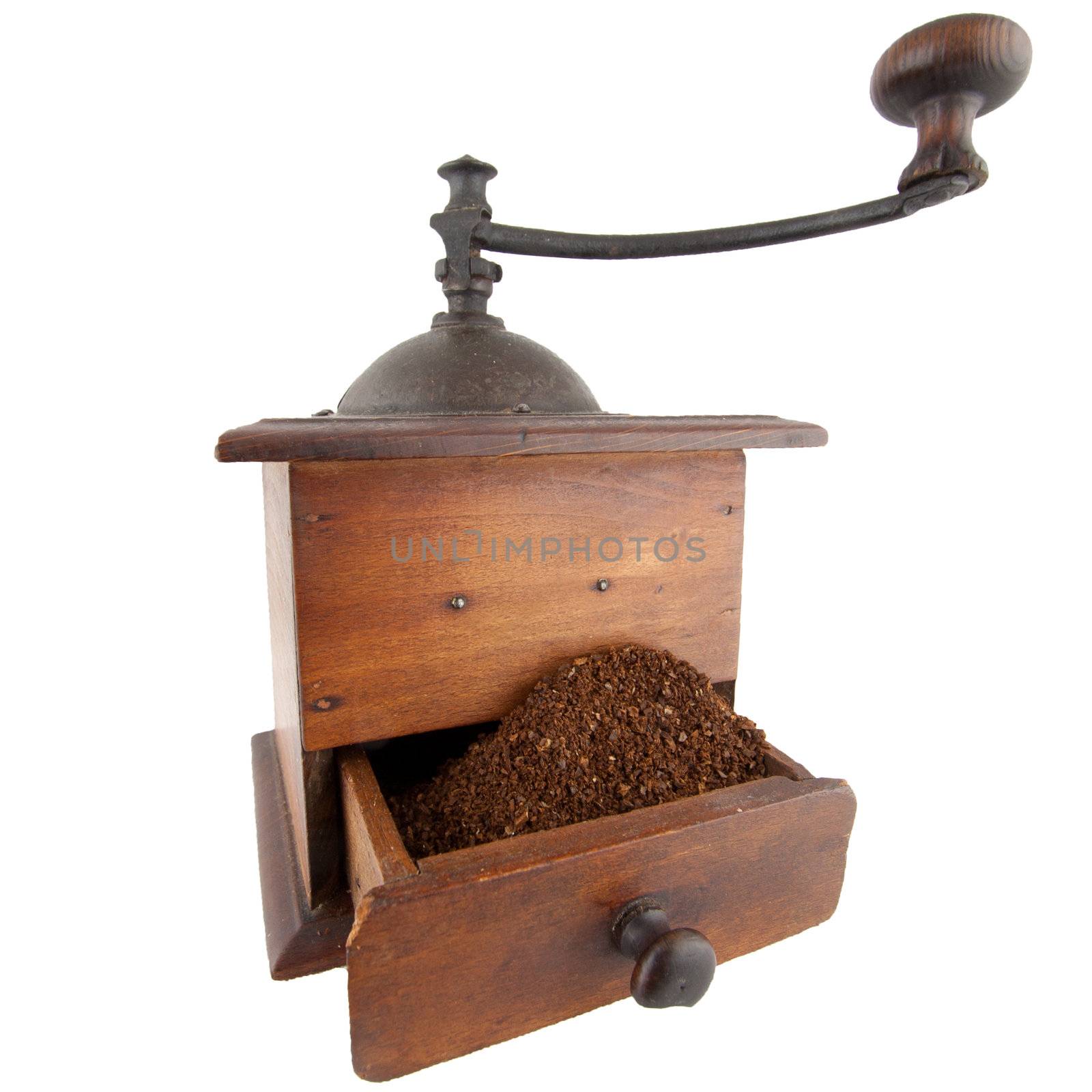 Traditional coffee grinder with its drawer