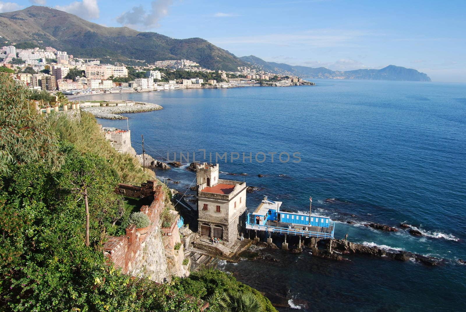 The city of Genoa with its palace, skyscraper and the acient quarter of Boccadasse