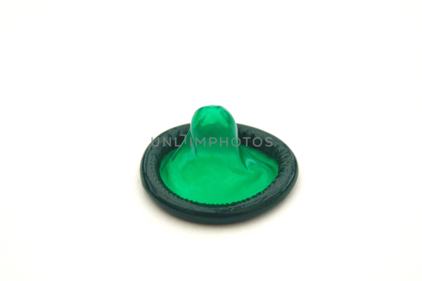 Bright Green Condom on White Background
