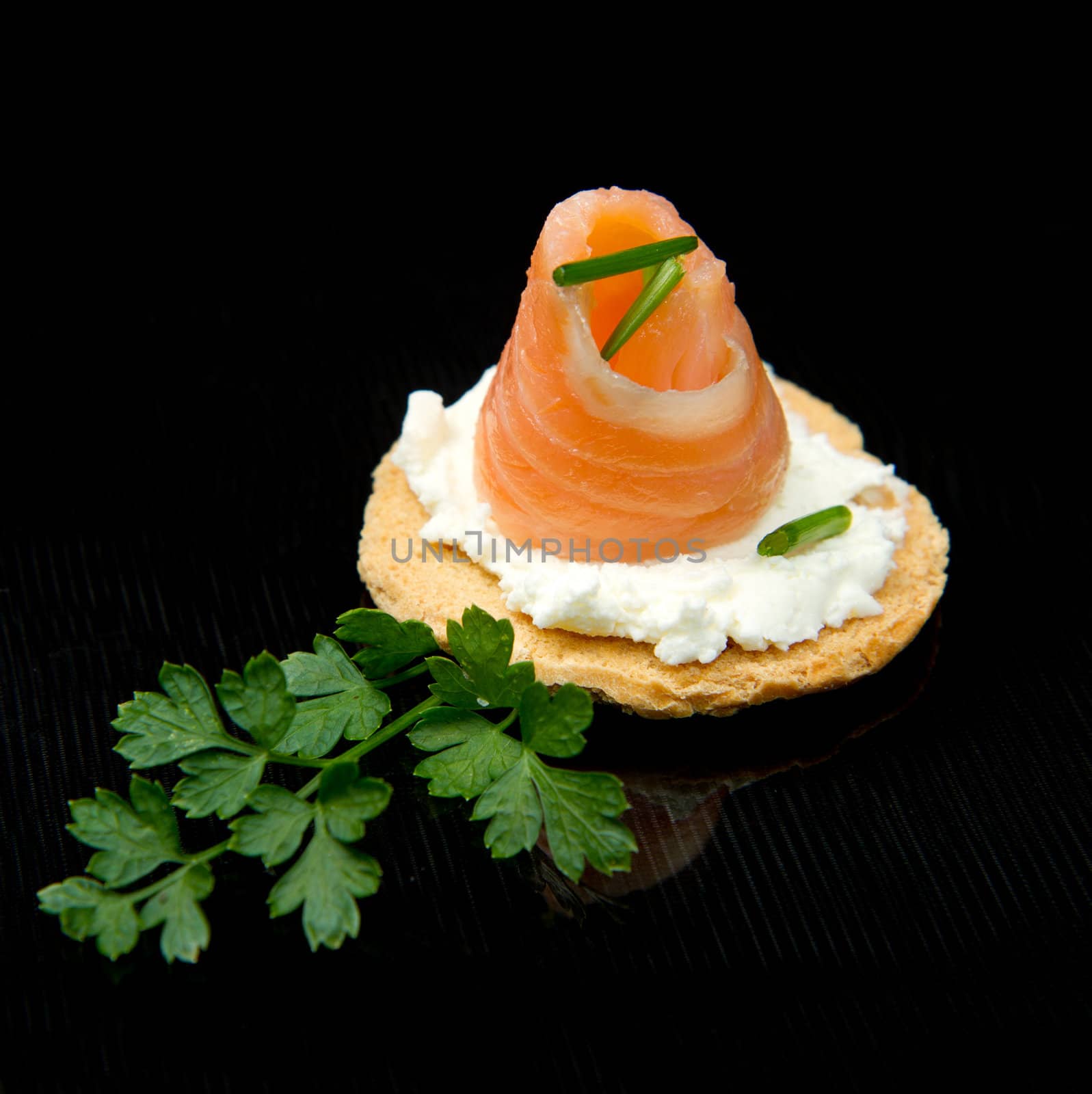 Canape with Salmon on white dish