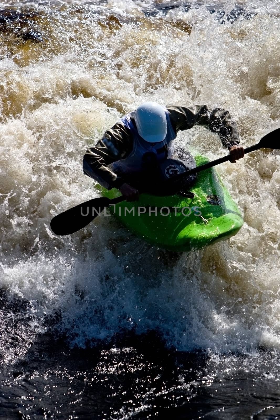 Kayak freestyle on whitewater