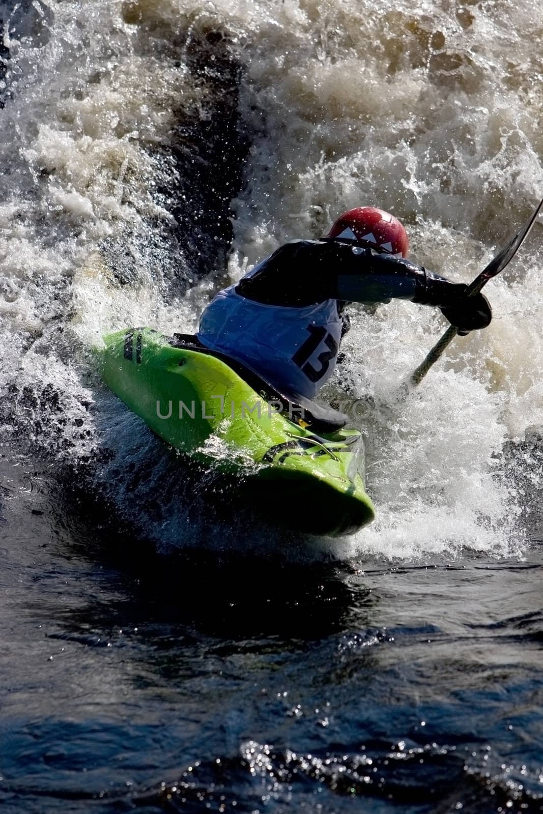 Kayak freestyle on whitewater