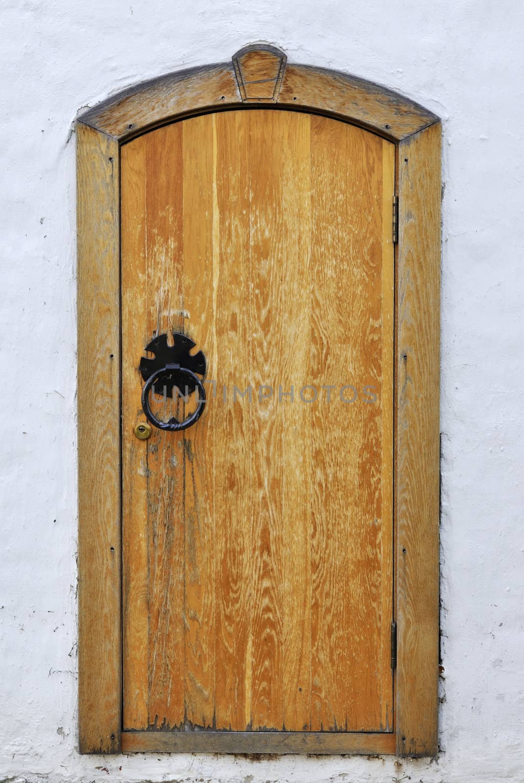 Vintage wooden door in ancient monastery of Suzdal, Russia